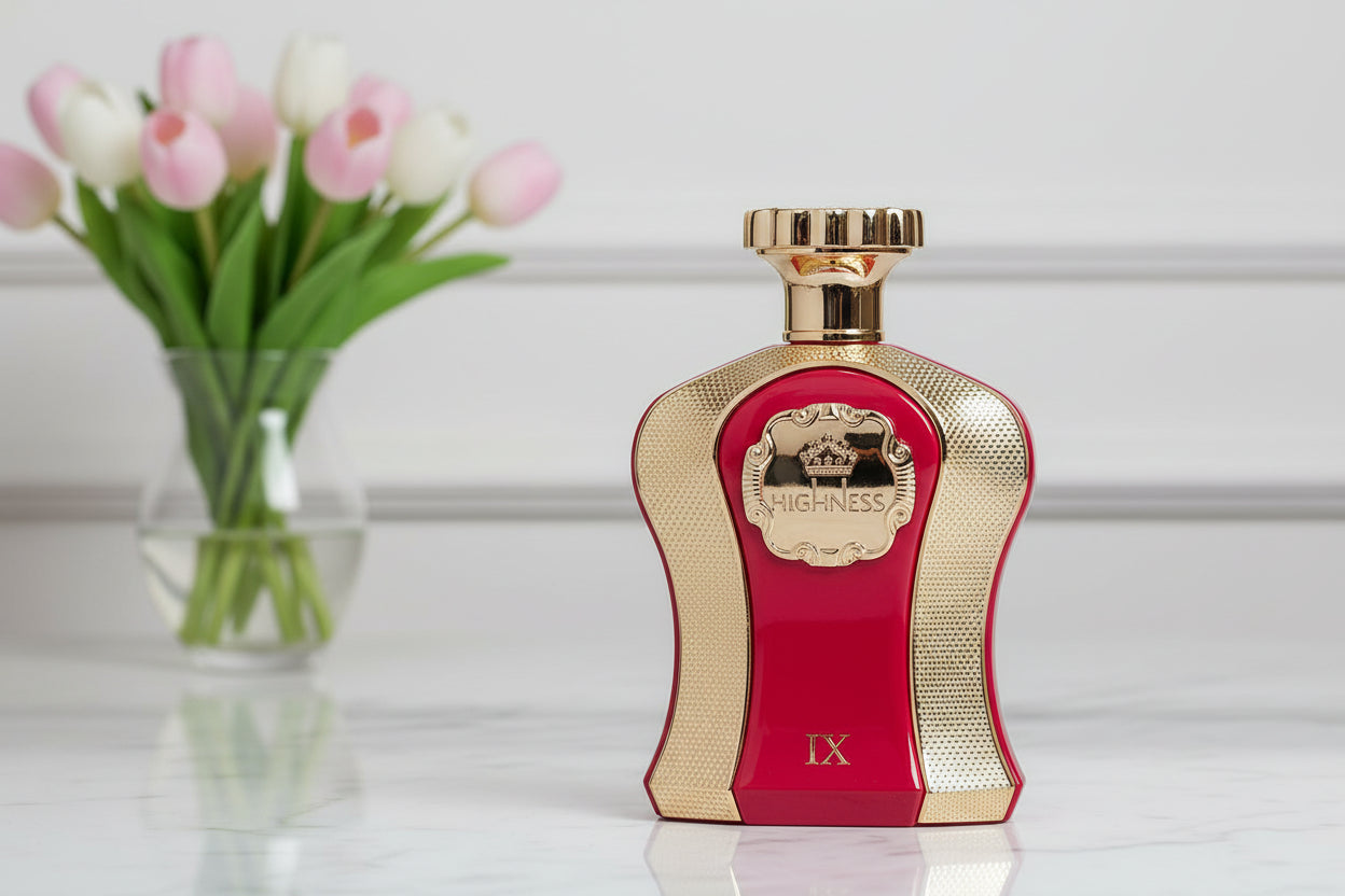 red and gold perfume bottle with matching box